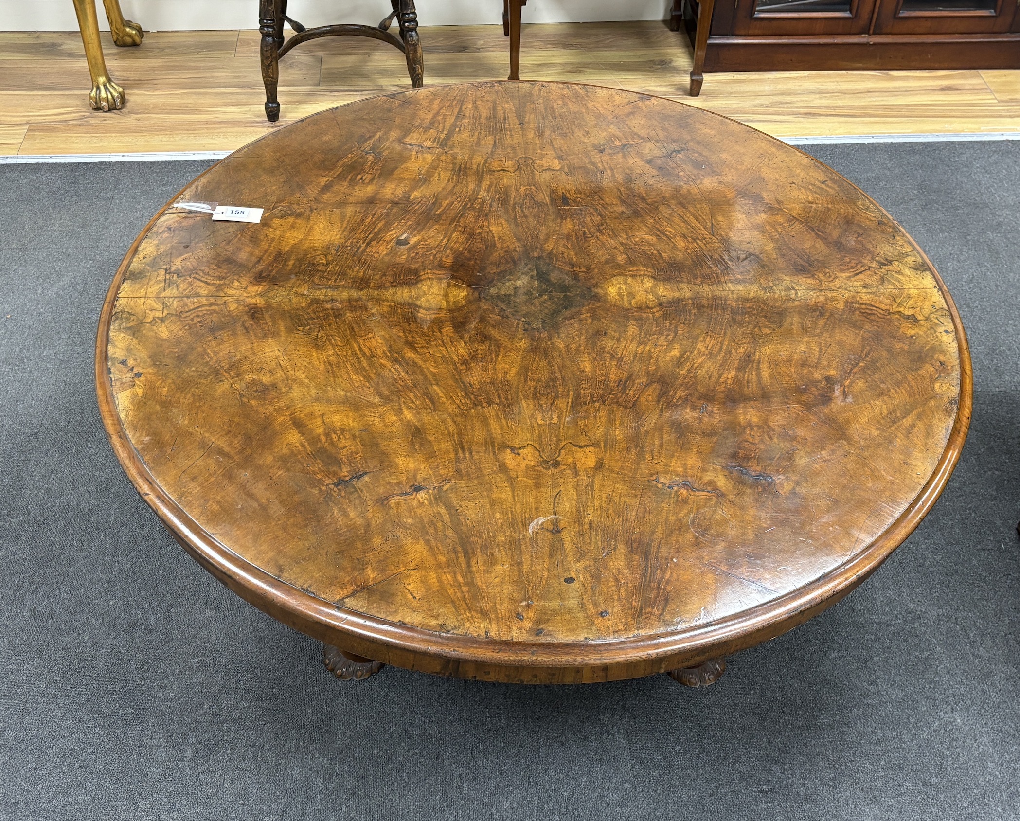 A 19th century and later circular Continental walnut low table, adapted and height reduced, diameter 120cm, height 53cm